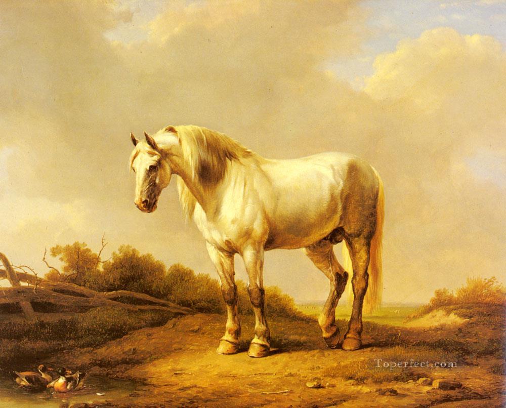 Un étalon blanc dans un paysage Eugene Verboeckhoven cheval Peintures à l'huile